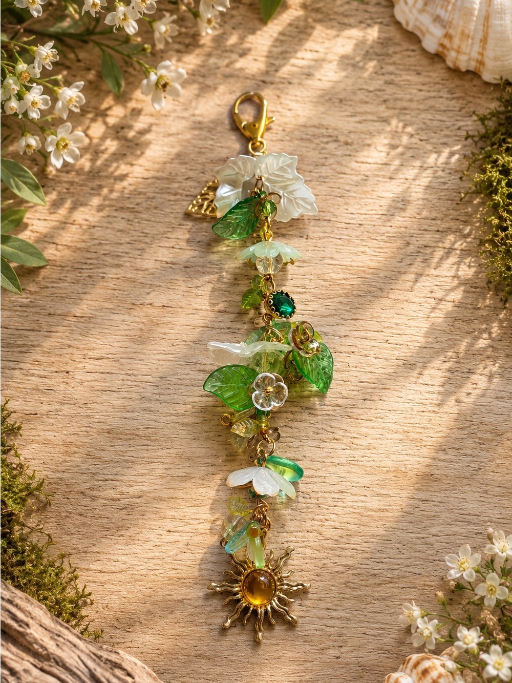 Gold-Tone Green Floral Charm Pendant with Sun Accent